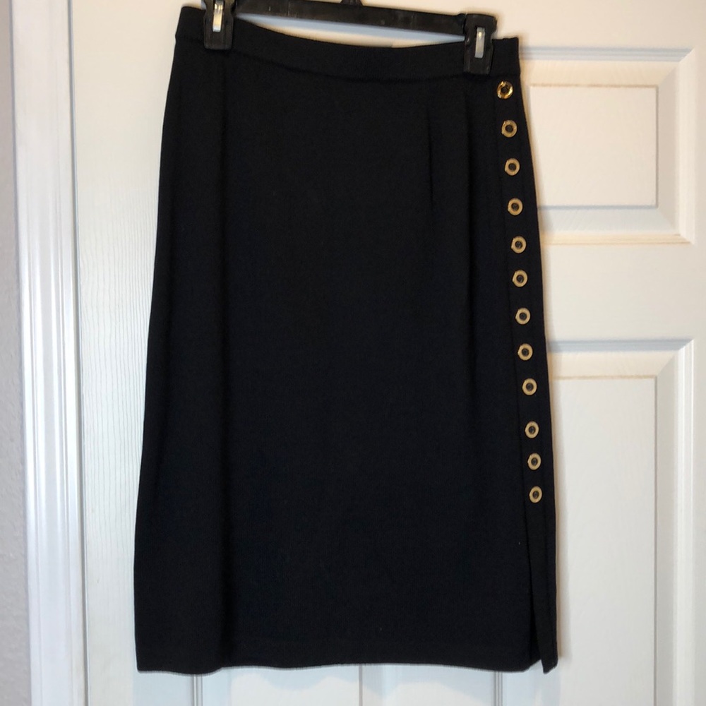 Classy and beautiful black skirt with gold buttons